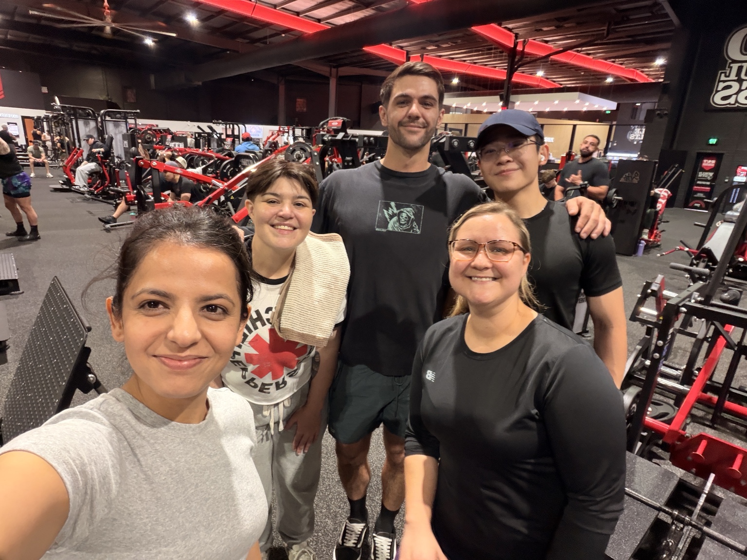 Josh and members of the training community together in the gym